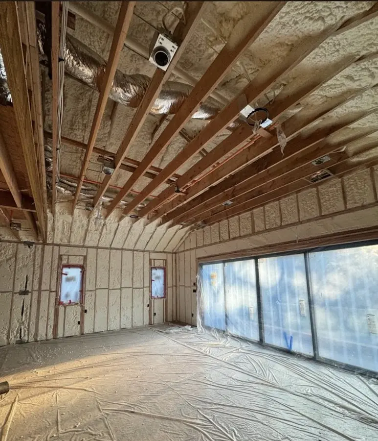 Interior walls and ceiling insulated with spray foam during new construction in Shelton